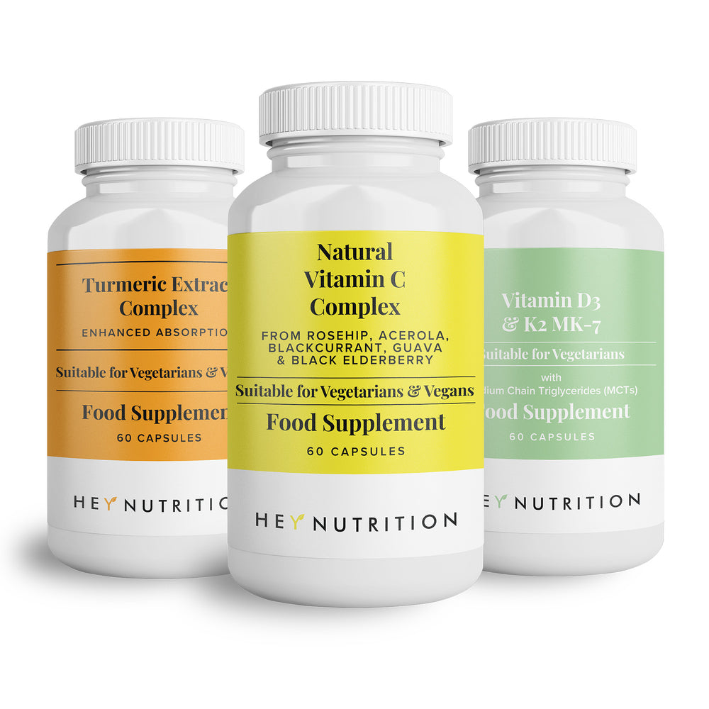 Front-facing view of Hey Nutrition's Turmeric Extract Complex, Natural Vitamin C Complex, and Vitamin D3 & K2 MK-7 supplement bottles, shown on a clean white background.